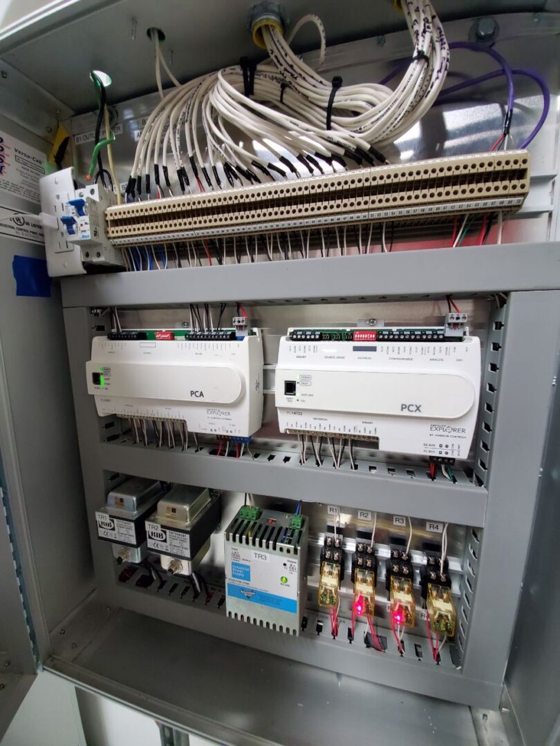 A close up of electrical equipment in an enclosure